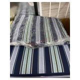 2 outdoor striped cushions one still vacuum