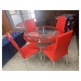 Red retro looking dinning table and 4 chairs