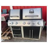 Damaged propane grill has been used