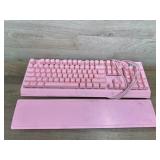 Pink wired keyboard and tray