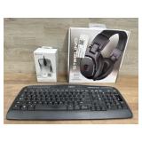 Studio headphones keyboard and mouse