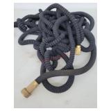 Expanding fabric hose, used