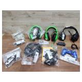 Box of headphones and miscellaneous accessories