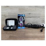 Camping flashlight. Goggles. Hair straightener