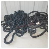 2 fabric wrapped expanding hoses, used