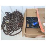2 fabric wrapped expanding hoses, used.