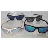 Lot of 4 sunglasses, used, some with damage