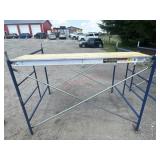 Metaltexh blue scaffolding with Walk board