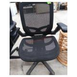 Used black office chair in working condition