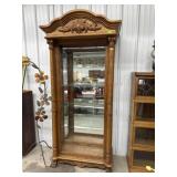 Solid Oak lighted curio cabinet with glass