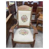 Oak rocker with upholstered needlepoint