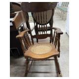 Antique Caine bottom rocking chair