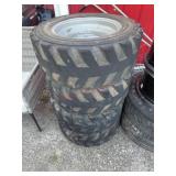 4 skid steer/forklift tires