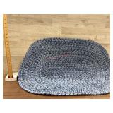 Small round blue rug