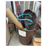 Trash can of umbrella , scraper and mister and