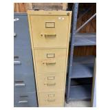 Yellowed 4 drawer file cabinet