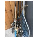 8- Various fishing poles with reels and fish net