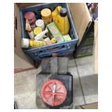 Crate with oils, cleaners and oil catch pan