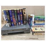 Box with VHS player and VHS tapes