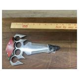 Knife with finger grip