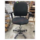 Black fabric bar height office chair with arms