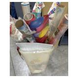 Trash can of holiday wrapping paper