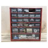 Red hardware organizer with bolts and hardware