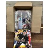 Box of hockey cards and magazines