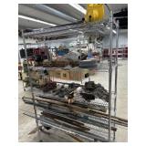 Pipe, chains. shovels, blower and contents of