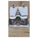 Paper mï¿½chï¿½ style Decorator snowy roof cabin