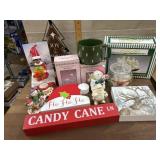 Box of Christmas figurines , signs and misc.