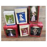 6- Hallmark ornaments Barbie, Curious George