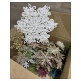 Box of various snowflake decorations