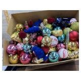 Box full of Christmas ornaments