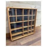 Brown wooden shelved cabinet