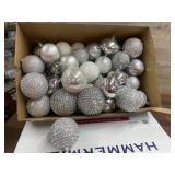 Box of silver Christmas ornaments