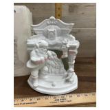 Dept. 56.  Santa filling the stockings