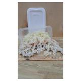 Tote of cream color strung beads