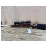 International 7mm bolt action rifle.  S# s3663
