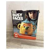 Busy Faces roly poly toy