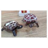 Pair of old wind up turtles