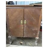 Sewing cabinet with old Singer machine