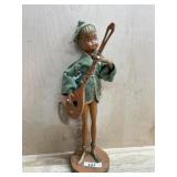 Wood Figure playing musical instrument