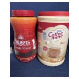 Can of coffee creamer and  Folgers instant