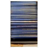 Box of coin collector display books