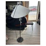 Black metal floor lamp with white shade