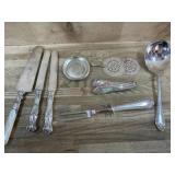 Bag of siver plate serving spoons and flatware