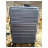 Hardside carry in luggage with telescoping handle