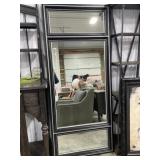 Full length mirror on black and silver frame