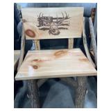 Custom built log leg bench with Deer and Flag on